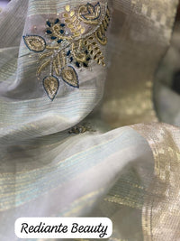 Pastel Green Tissue Organza Saree with Gold Zari & Floral Embroidery