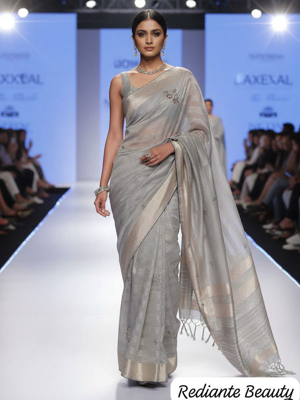 Pastel Green Tissue Organza Saree with Gold Zari & Floral Embroidery