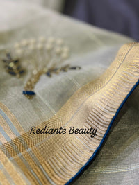 Powder Blue Tissue Organza Saree – Golden Opulence Cascade