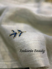 Powder Blue Tissue Organza Saree – Golden Opulence Cascade