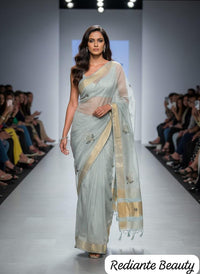 Powder Blue Tissue Organza Saree – Golden Opulence Cascade