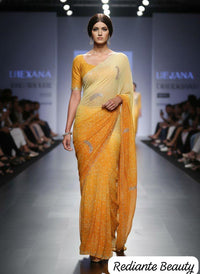 Golden Saffron Bandhani Georgette Saree – Silver Cut Dana & Beaded Leaf Detailing