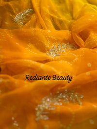 Golden Saffron Bandhani Georgette Saree – Silver Cut Dana & Beaded Leaf Detailing