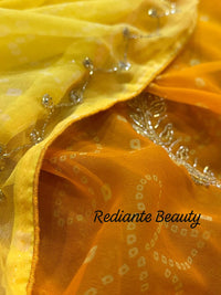 Golden Saffron Bandhani Georgette Saree – Silver Cut Dana & Beaded Leaf Detailing