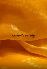 Golden Saffron Bandhani Georgette Saree – Silver Cut Dana & Beaded Leaf Detailing
