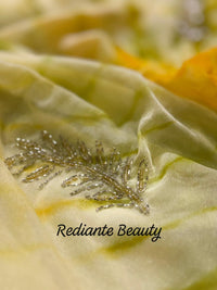 Olive Yellow Silk Georgette Tie-Dye Saree – Golden & Silver Leaf Embellishments