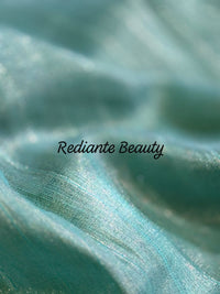 Turquoise Green Tissue Organza Saree – Peacock Elegance in Gold Weave