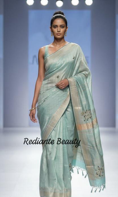 Aqua Blue Tissue Organza Saree – Peacock Blue Embellished Grandeur