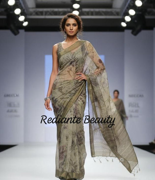 Bottle Green & Gold Tissue Organza Saree – Floral Print with Pearl and Cut Dana Embellishments