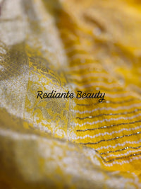 Golden Turmeric Yellow Silk Saree – Crimson Red Border & Bandhani Art Embellishments