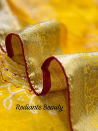 Golden Turmeric Yellow Silk Saree – Crimson Red Border & Bandhani Art Embellishments
