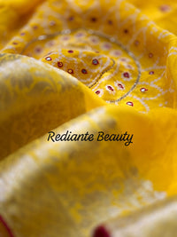 Golden Turmeric Yellow Silk Saree – Crimson Red Border & Bandhani Art Embellishments
