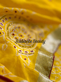 Golden Turmeric Yellow Silk Saree – Crimson Red Border & Bandhani Art Embellishments