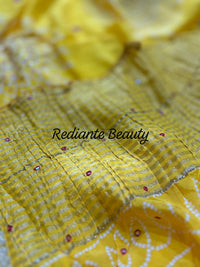 Golden Turmeric Yellow Silk Saree – Crimson Red Border & Bandhani Art Embellishments