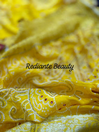 Golden Turmeric Yellow Silk Saree – Crimson Red Border & Bandhani Art Embellishments