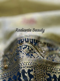 Creamy Golden Brocade Silk Saree – Peacock Blue Grandeur