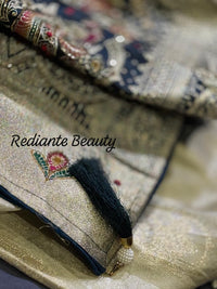 Creamy Golden Brocade Silk Saree – Peacock Blue Grandeur