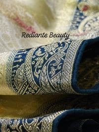 Creamy Golden Brocade Silk Saree – Peacock Blue Grandeur
