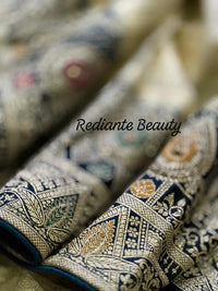 Creamy Golden Brocade Silk Saree – Peacock Blue Grandeur
