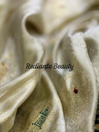 Creamy Golden Brocade Silk Saree – Peacock Blue Grandeur