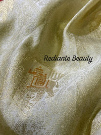 Creamy Golden Brocade Silk Saree – Peacock Blue Grandeur