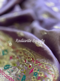 Lavender Dola Silk Saree – Golden Embellished Peacock Lotus Elegance